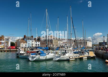 Yachts in the picturesque harbour at Weymouth, Dorset, England, UK Stock Photo