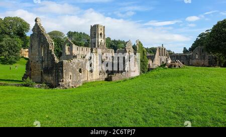 Fountains Abbey, near Ripon, is one of the largest and best preserved ruined Cistercian monasteries in England Stock Photo