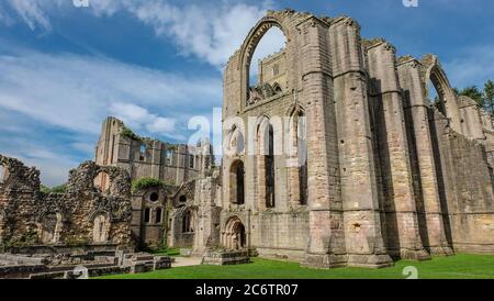 Fountains Abbey, near Ripon, is one of the largest and best preserved ruined Cistercian monasteries in England Stock Photo