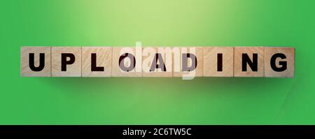 uploading word on wooden cubes. Internet resources concept Stock Photo