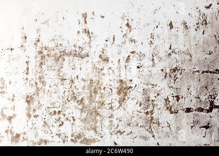 Old white cracked cement concrete white wall distressed grunge texture background Stock Photo