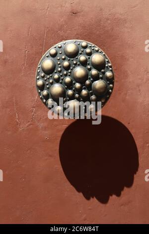 Decorative element. Vintage brass door handle in the form of seashell.  Pisa. Italy Stock Photo - Alamy