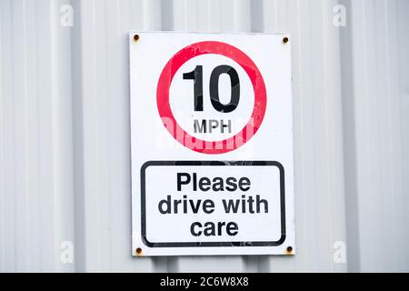 Ten mph construction building site speed safety sign England Stock Photo