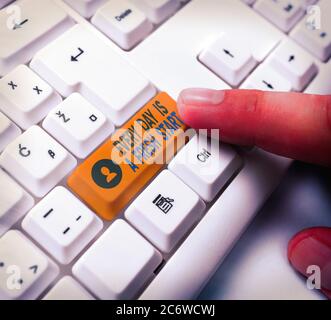 Conceptual hand writing showing Every Day Is A Fresh Start. Concept meaning an opportunity to start over without prejudice White pc keyboard with note Stock Photo