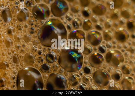 Abstract macro of frothy coffee bubbles Stock Photo