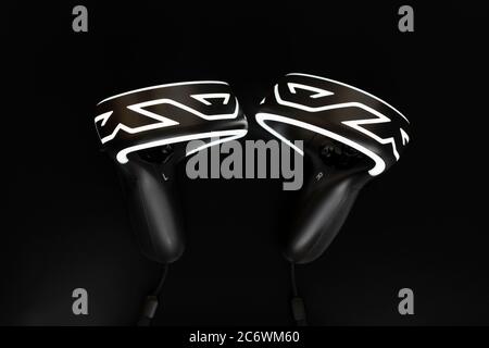 Modern virtual reality controllers on black background Stock Photo