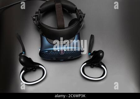 Virtual reality headset on black background, top view Stock Photo