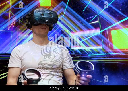 Shocked man in virtual reality Stock Photo