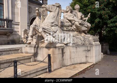 Statue of Neptune symbolising navigation outside the Glamorgan County Hall building, Cardiff, South Wales Stock Photo