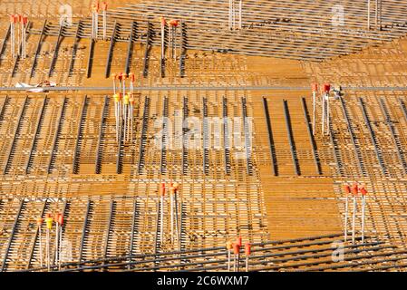 Steel rebar, ready for concrete to be poured. Concrete casting preparation and layout for steel rebar. Stock Photo