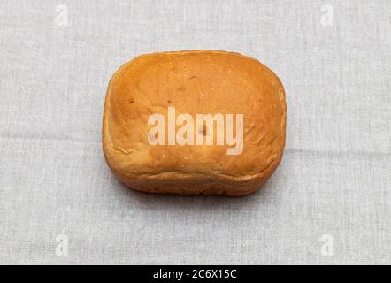 Fresh wheat bread on a linen towel Stock Photo