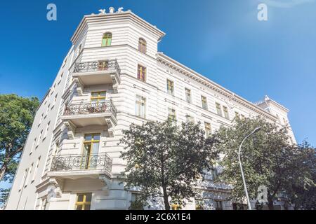 Facade of a beautiful restored old apartment building Stock Photo
