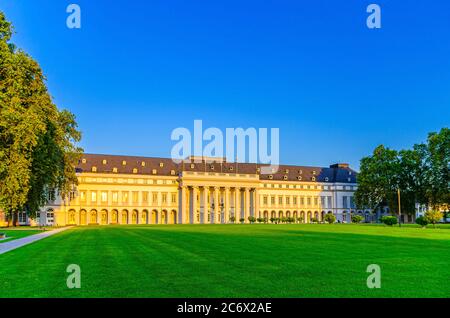 Koblenz, Germany, August 23, 2019: Electoral Palace Schloss building and Schlossvorplatz green grass lawn square in Koblenz historical city centre, blue sky background, Rhineland-Palatinate state Stock Photo