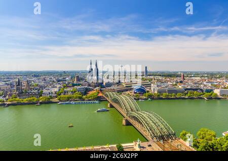 Aerial panoramic view of Cologne cityscape of historical city centre with Cathedral, central railway station Hauptbahnhof and Hohenzollern Bridge across Rhine river, North Rhine-Westphalia, Germany Stock Photo