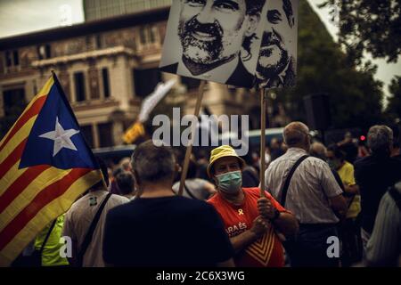 Barcelona, Spain. 12th July, 2020. Catalan separatists gather in front of the Spanish government delegation in Barcelona in support of Catalan separatist leaders and to commemorate their 1000 days of imprisonment in relation with a banned referendum on secession and an independence vote at the Catalan Parliament in October 2017 Credit: Matthias Oesterle/Alamy Live News Stock Photo