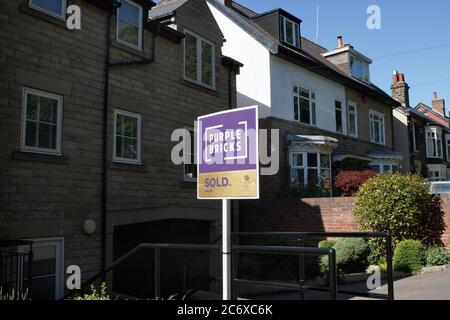 Purple Brick Estate Agents Sold Sign