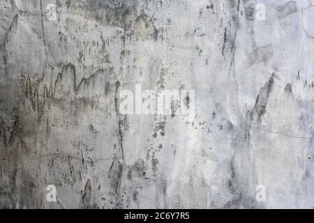 Concrete wall plastered and polished style Loft Dark gray and with cracks. Stock Photo