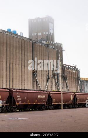 Grain silos and BNSF trains on the gritty waterfront of Superior, Wisconsin, USA [No property release; available for editorial licensing only] Stock Photo
