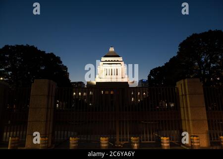 The Japanese National Diet Building illuminated at night in Nagatacho in Tokyo, Japan. Stock Photo