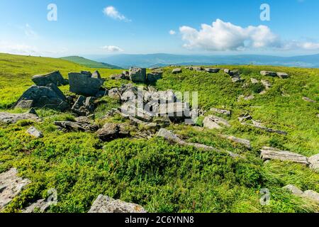 mountain landscape. white sharp stones on the hillside in morning dappled light Stock Photo