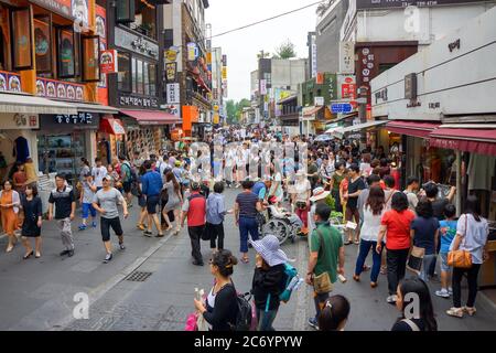 Seoul, South Korea - 1 June 2014, Asian Tourist and local Korean people enjoy walking and shopping around in the shopping street, Seoul, South Korea. Stock Photo