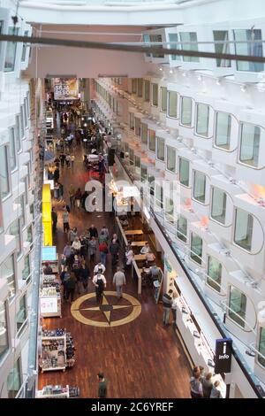 Baltic sea - March 08, 2019: Inner promenade with shops, cafes, and  restaurants in the cruise ferry ship Silja Symphony. Operated by Tallink  Silja Line on the route Helsinki-Stockholm, the ship has