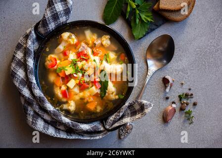 Vegetable soup with cauliflower and other vegetables Stock Photo