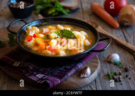 Vegetable soup with cauliflower and other vegetables Stock Photo