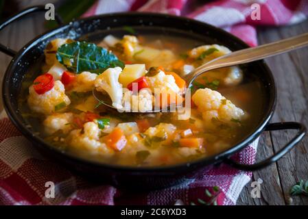 Vegetable soup with cauliflower and other vegetables Stock Photo