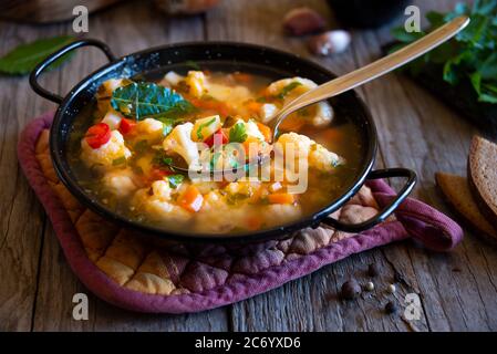 Vegetable soup with cauliflower and other vegetables Stock Photo