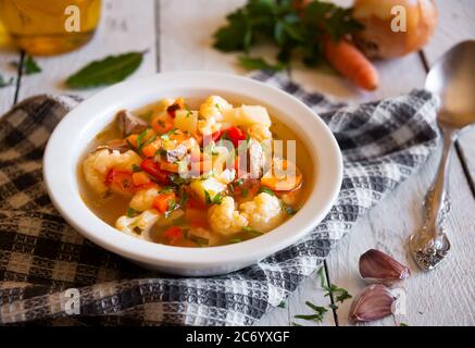 Vegetable soup with cauliflower and other vegetables Stock Photo