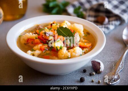 Vegetable soup with cauliflower and other vegetables Stock Photo