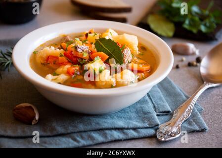 Vegetable soup with cauliflower and other vegetables Stock Photo