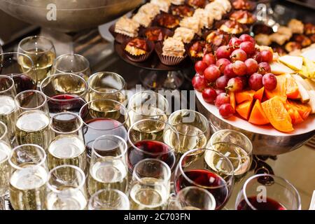 A dining table filled with wine glasses Stock Photo