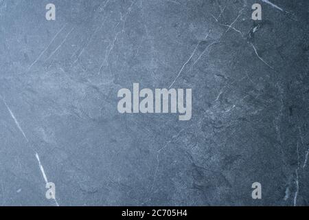 Blue scratched stone texture on background. Texture wallpaper Stock Photo