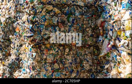 Milk cartons sorted and other waste sorted ready for waste treatment. Stock Photo