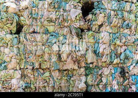 Plastic sorted and other waste sorted ready for waste treatment. Stock Photo