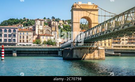 Scenic panorama of Vienne city with the footbridge over Rhone River and Saint Maurice Cathedral of Vienne Isere France Stock Photo