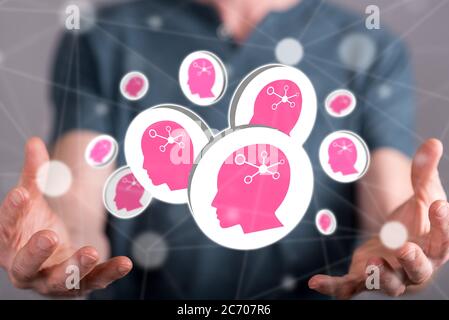 Artificial intelligence concept between hands of a man in background Stock Photo