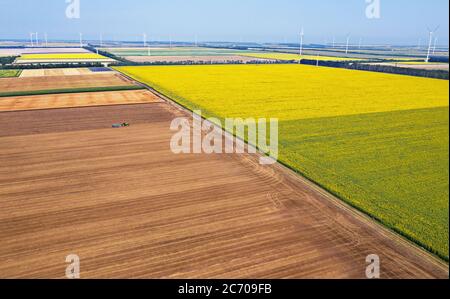 Drone view of a farmer plowing his field. Dron picture! Stock Photo