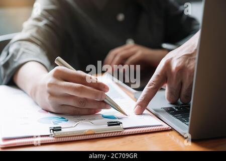 Close up Business meeting and discussing for finance, tax, accounting, statistics and analytic research concept Stock Photo