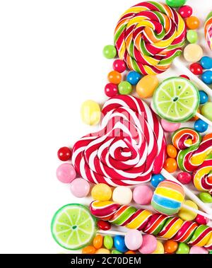 Colorful candies and lollipops isolated on a white background Stock Photo