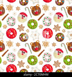 Seamless pattern with christmas ginger cookies, donuts, candy and cinnamon isolated on white background. Stock Photo
