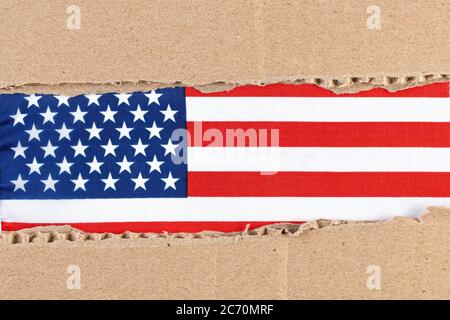 Torn paper filled with a United States flag in red, white and blue. Great for any US holiday like Memorial Day, July 4th, Labor Day, Presidents Day or Stock Photo