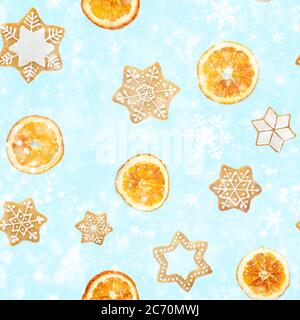 Seamless pattern with Christmas gingerbread cookies in the shape of snowflakes and dried oranges on blue snowy background. Top view. Stock Photo