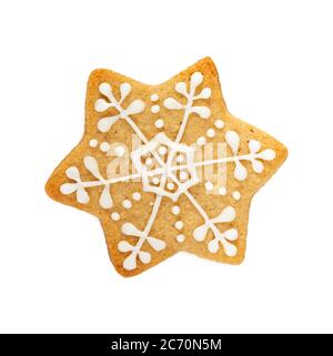 Christmas gingerbread cookies in the shape of snowflake isolated on white background. Top view. Stock Photo