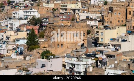 Savur, Mardin, Turkey - January 2020: Town of Savur with old stone houses on a hill Stock Photo