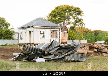 Old miner's cottage style house being pulled down to make way for new construction Stock Photo