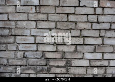 Grey Brick wall. background and texture. The brick wall is gray. Stock Photo