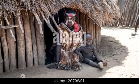 Omo valley, Ethiopia, September 2017: Portrait of unidentified Karo tribe woman with her child in Colcho, Omo Valley, Ethiopia. Stock Photo
